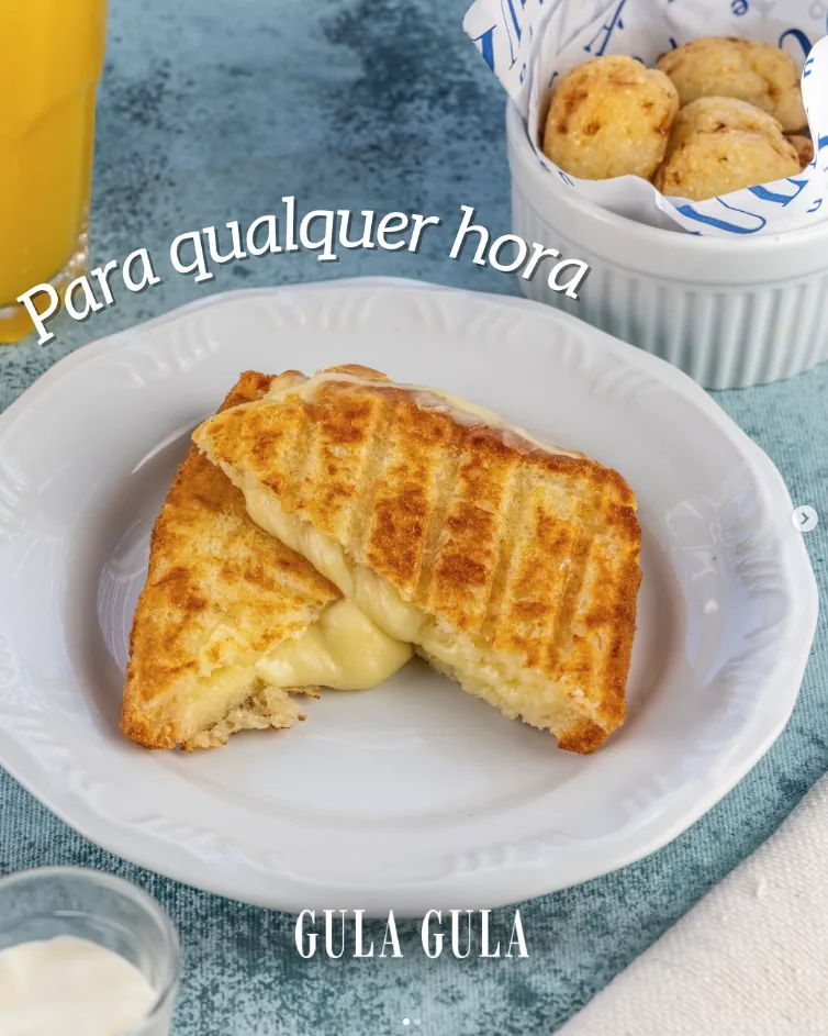 Peça de conteúdo do Gula Gula com sanduíche de queijo e a mensagem para qualquer hora.
